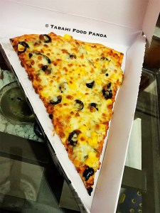 Lovers bite pizza slice