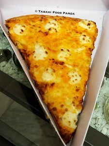 Cheesy 7 pizza slice